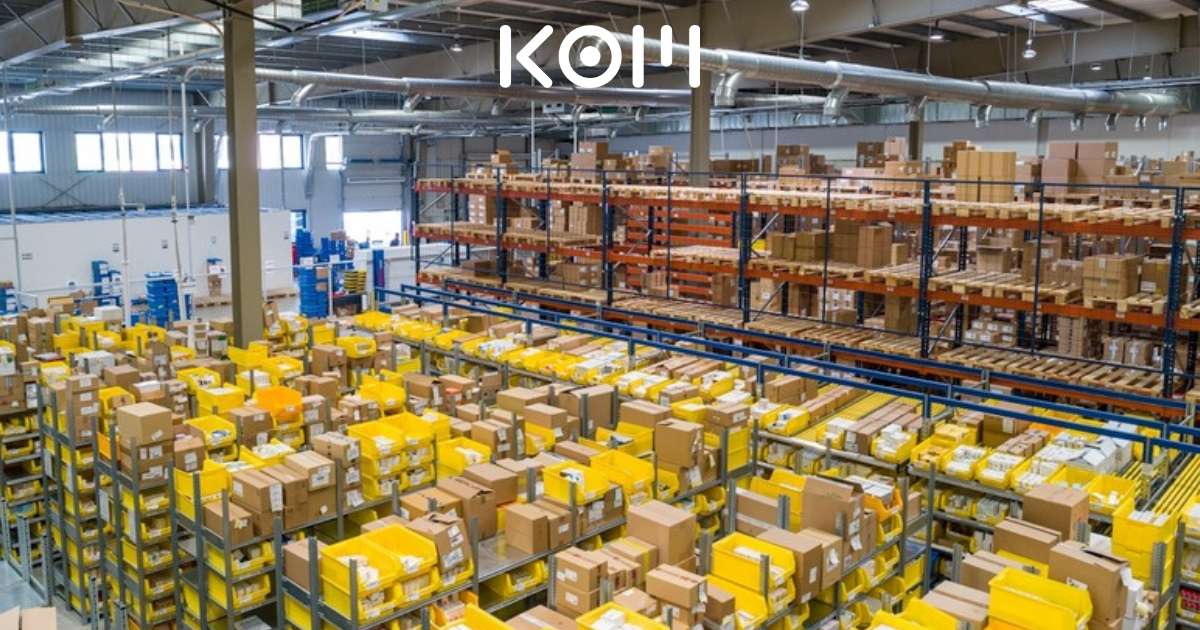Almacén de logística y distribución de mercancías - KOM Agencia Digital