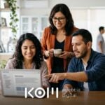 Equipo de marketing de una clínica revisa un borrador en la laptop, ejemplo de edición colaborativa en WordPress con roles (edición colaborativa wordpress)