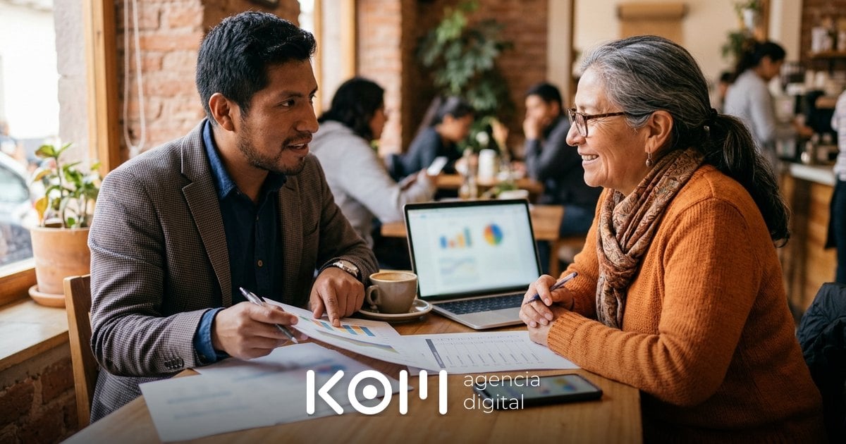 Dueño de negocio y consultora revisan un checklist en una cafetería para entender por qué Google Ads no funciona en su campaña