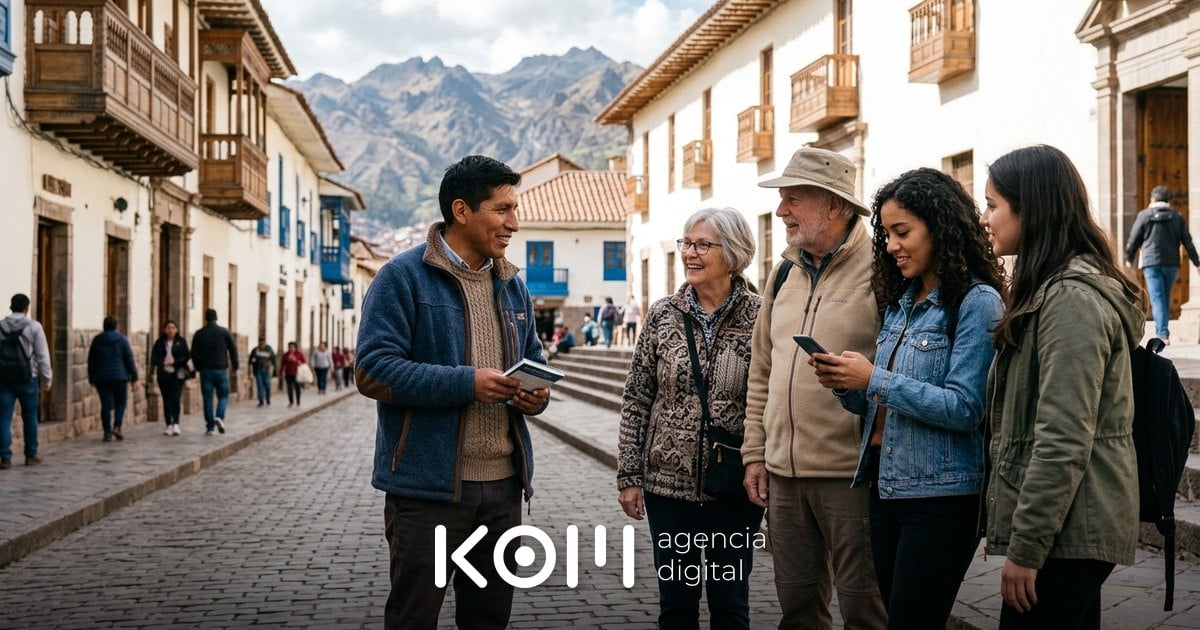 Guía cusqueño conversa con viajeros extranjeros que revisan en el celular un tour reservado por Google Ads para turismo (google ads turismo)
