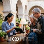 Recepcionista de un hotel de sillar ayuda a una pareja de turistas a confirmar su reserva online en un hotel de Arequipa (hoteles arequipa reservas online)