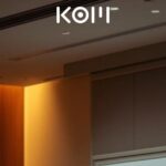 Auditorio universitario con presentación sobre redes neuronales y aprendizaje profundo - KOM