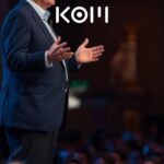 Investigador de inteligencia artificial presentando avances en seguridad y superinteligencia en conferencia