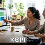 Diseñadora y dueño de negocio revisan en un monitor la estructura de un tema de bloques WordPress para su nueva web